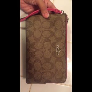 Pink and brown coach signature wallet